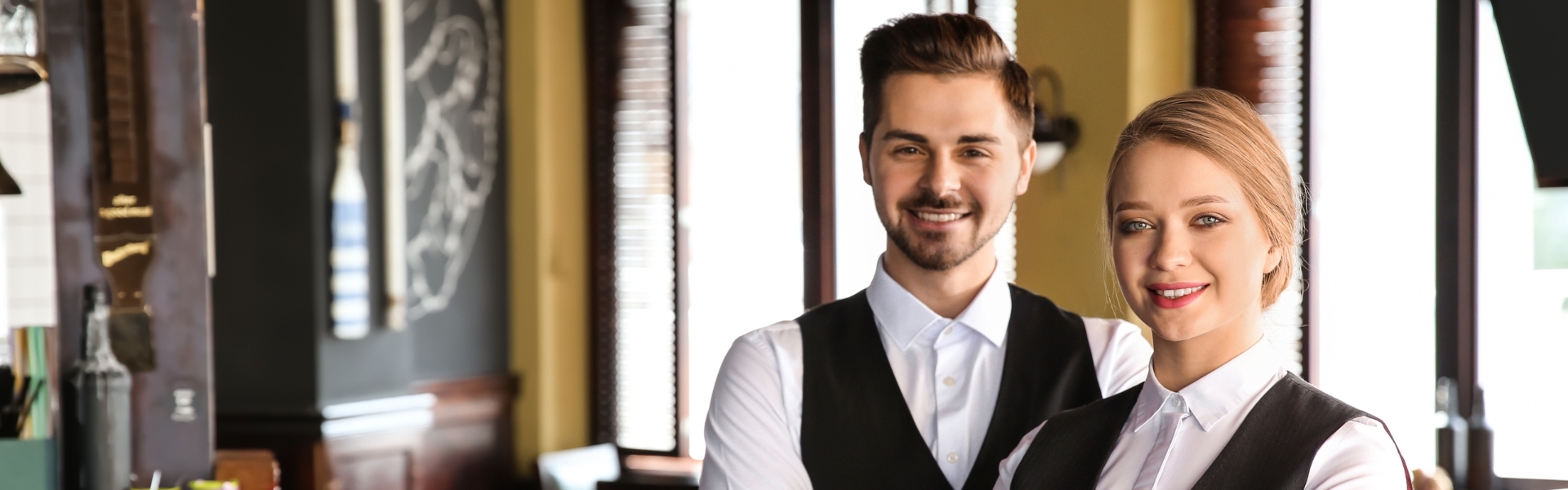 Father and child high-fiving on the golf course